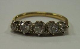 Appraisal: A five-stone diamond ring the graduated stones claw set on