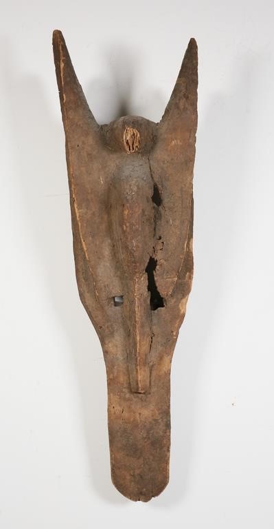 Appraisal: African Dogon mask from Mali Carved wood Extensive loss throughout