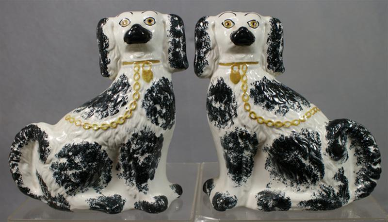 Appraisal: Pr Staffordshire white spaniels black trim and gold collar and