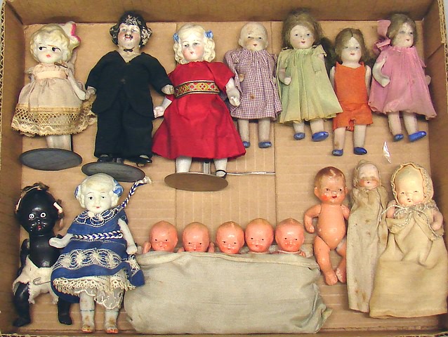 Appraisal: Lot of dolls Pair of molded hair German boy girl