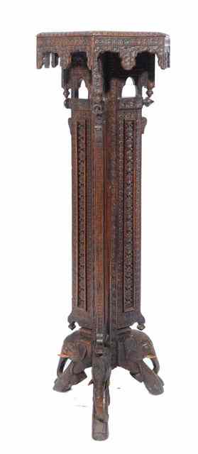 Appraisal: AN ORIENTAL ROSEWOOD JARDINERE STAND with floral carved hexagonal top