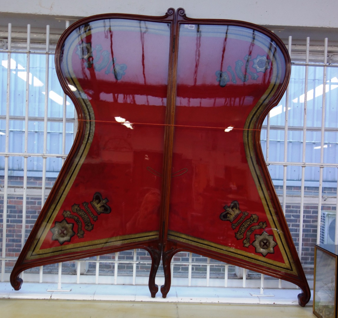 Appraisal: A th century mahogany framed shaped two fold screen mounted