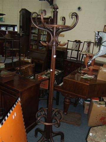 Appraisal: An early th Century bentwood coat and umbrella stand with