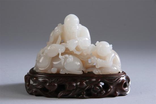 Appraisal: CHINESE WHITE JADE FIGURAL GROUP Late th century Carved to