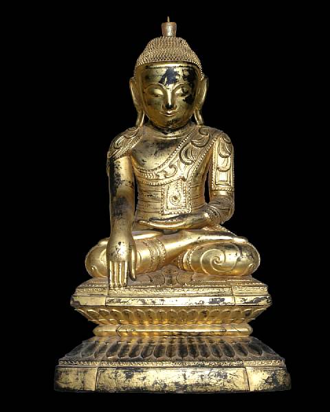 Appraisal: A Burmese gilt lacquered seated Buddha th century Seated in