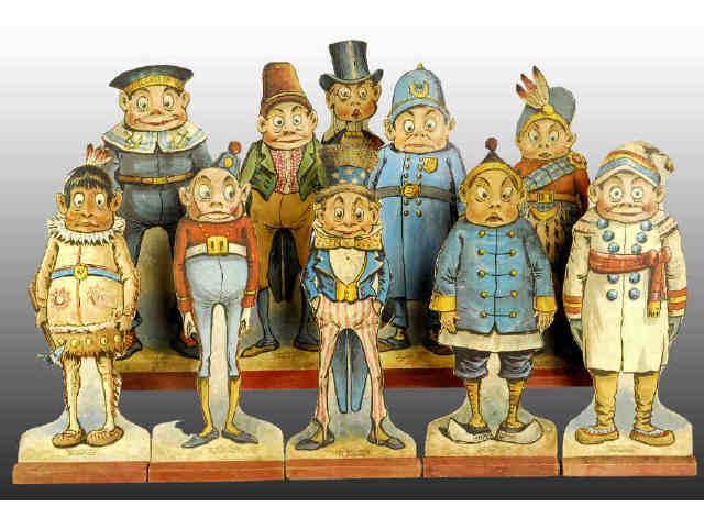 Appraisal: Palmer Cox Brownie Antique Pin Set Description Wooden figurines with