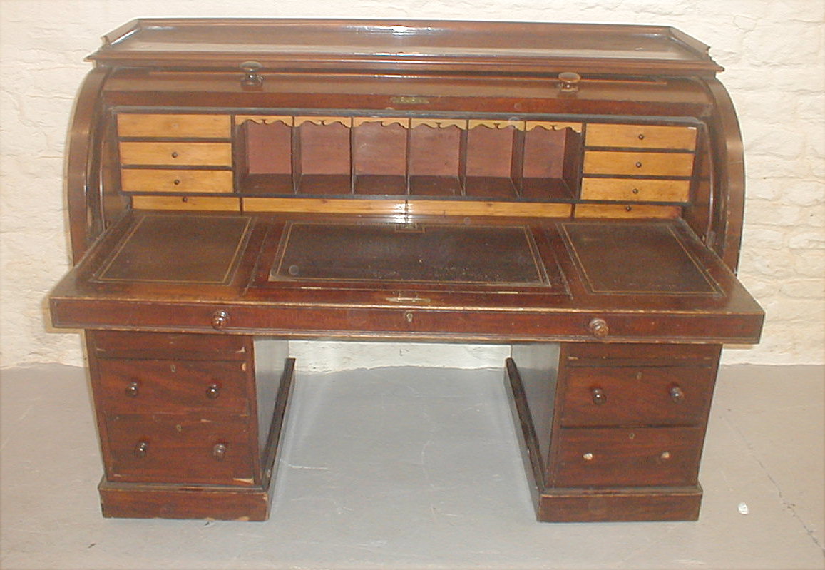 Appraisal: A Victorian mahogany cylinder top twin pedestal estate desk -