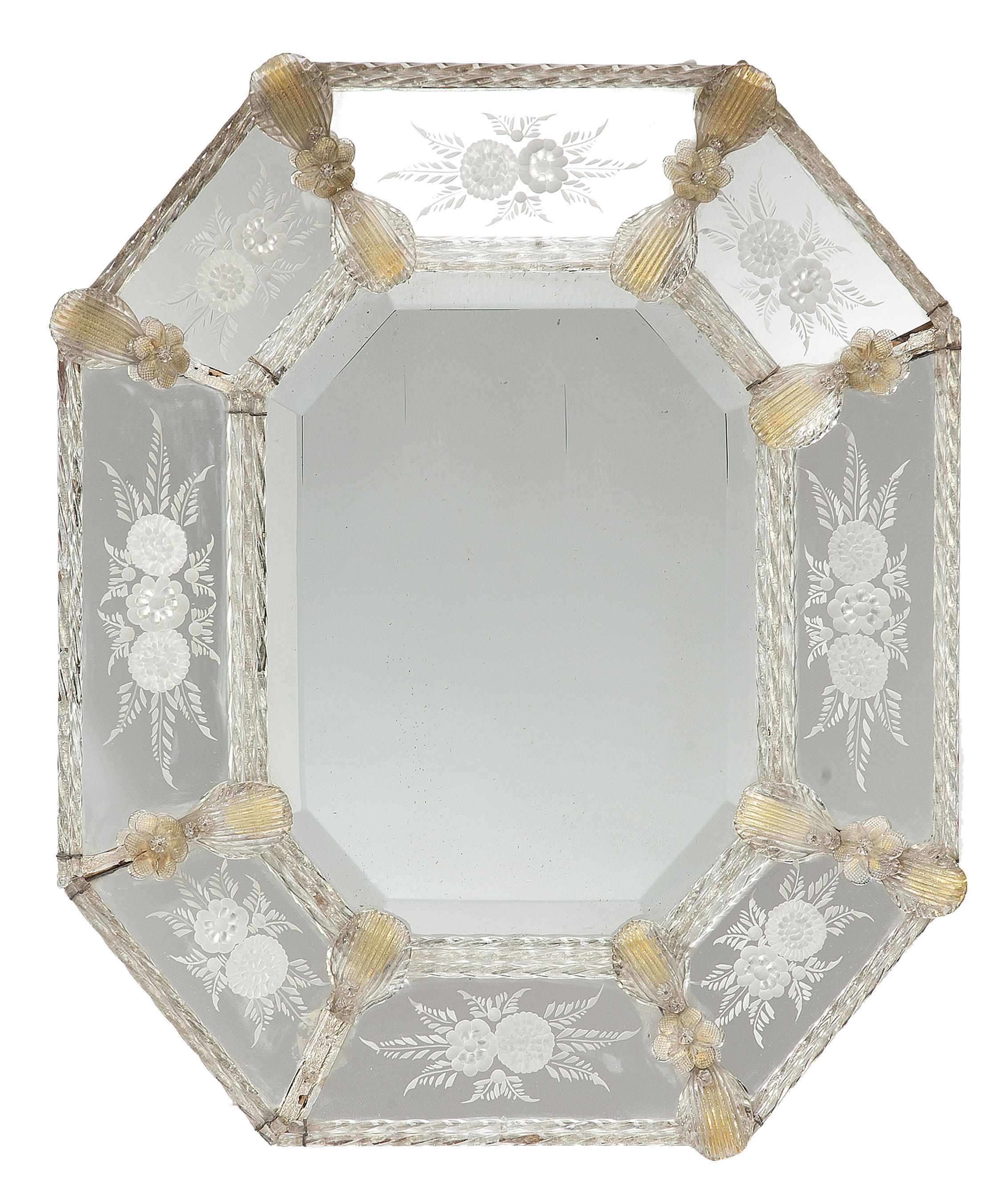 Appraisal: A Venetian acid etched and colored glass mirror of octagonal