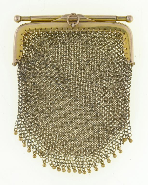 Appraisal: A GOLD AND GOLD MAIL PURSE with unusual sprung rod