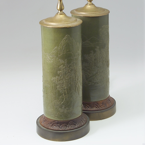 Appraisal: Pair of ceramic table lamps c each with embossed Asian-style