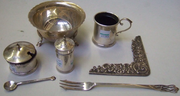 Appraisal: Silver comprising a shaped circular sugar bowl raised on three