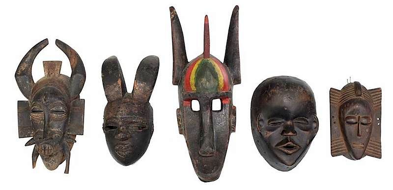 Appraisal: Five West African Carved Masks of varying forms including Dan