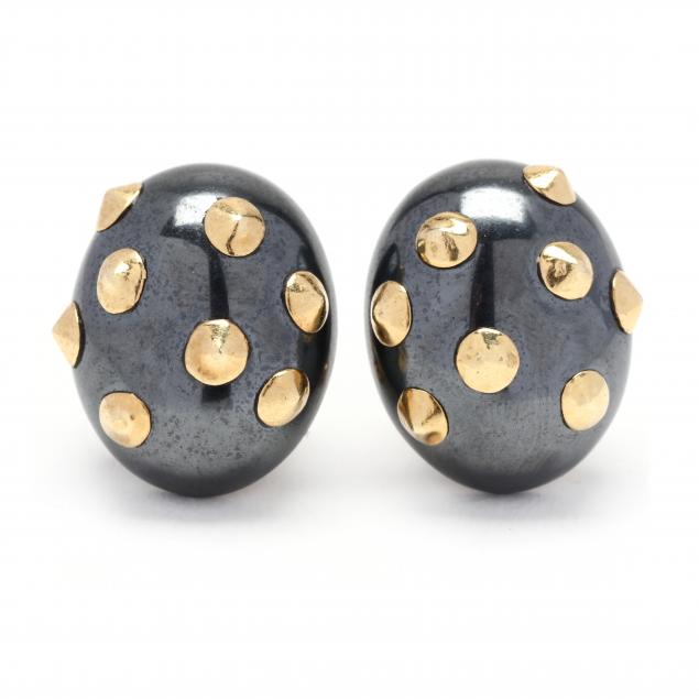 Appraisal: Hematite and Gold Spike Earrings Angela Cummings The oval bomb