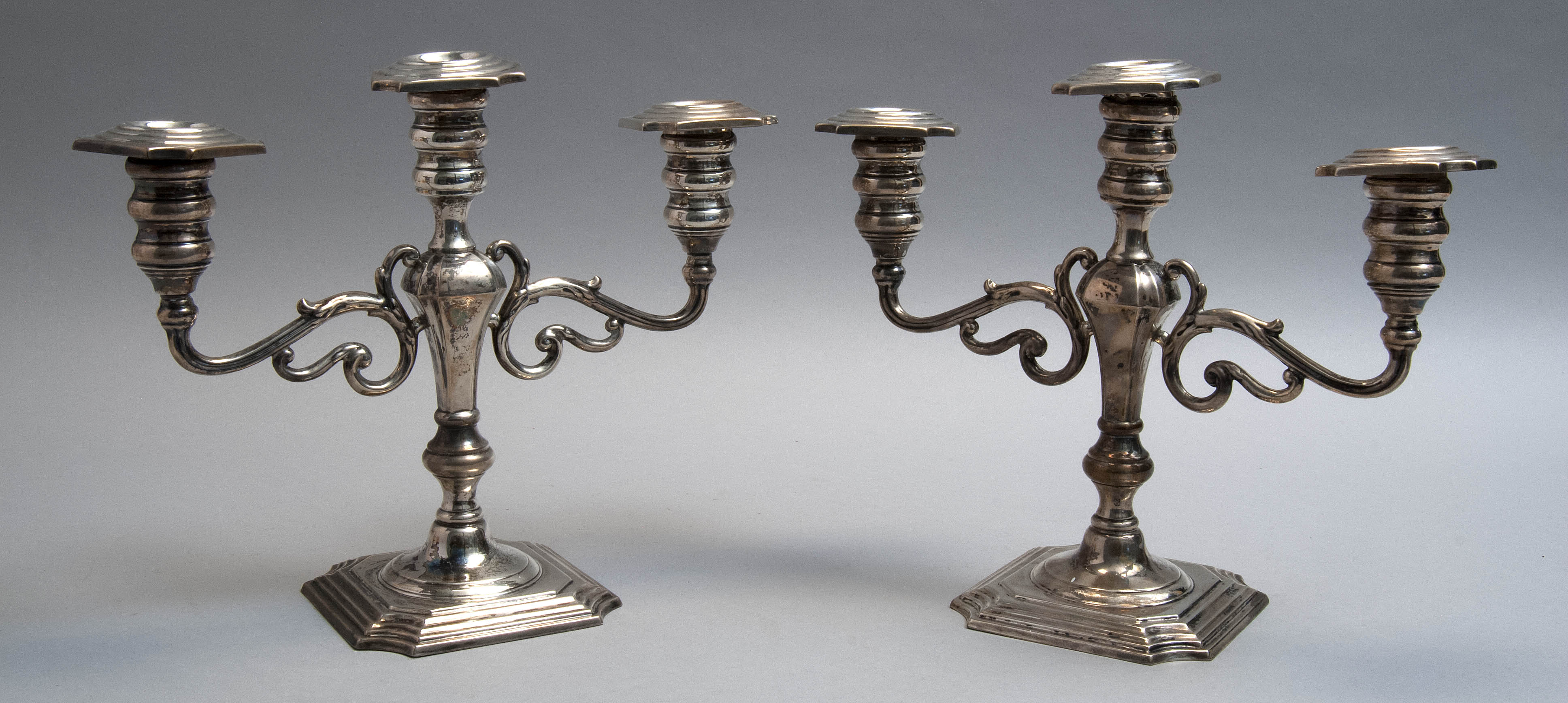 Appraisal: PAIR OF HAMILTON THREE-LIGHT WEIGHTED STERLING SILVER CANDELABRA th CenturyEach