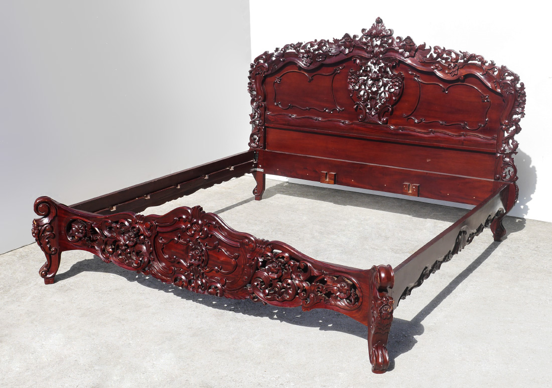 Appraisal: KING SIZED CARVED MAHOGANY BED Heavy carved rich dark Indonesian