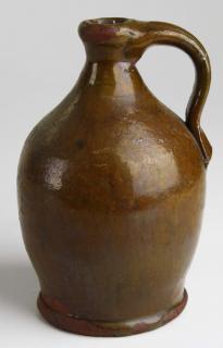 Appraisal: early th c redware ovoid jug minor glaze pockmarking ht