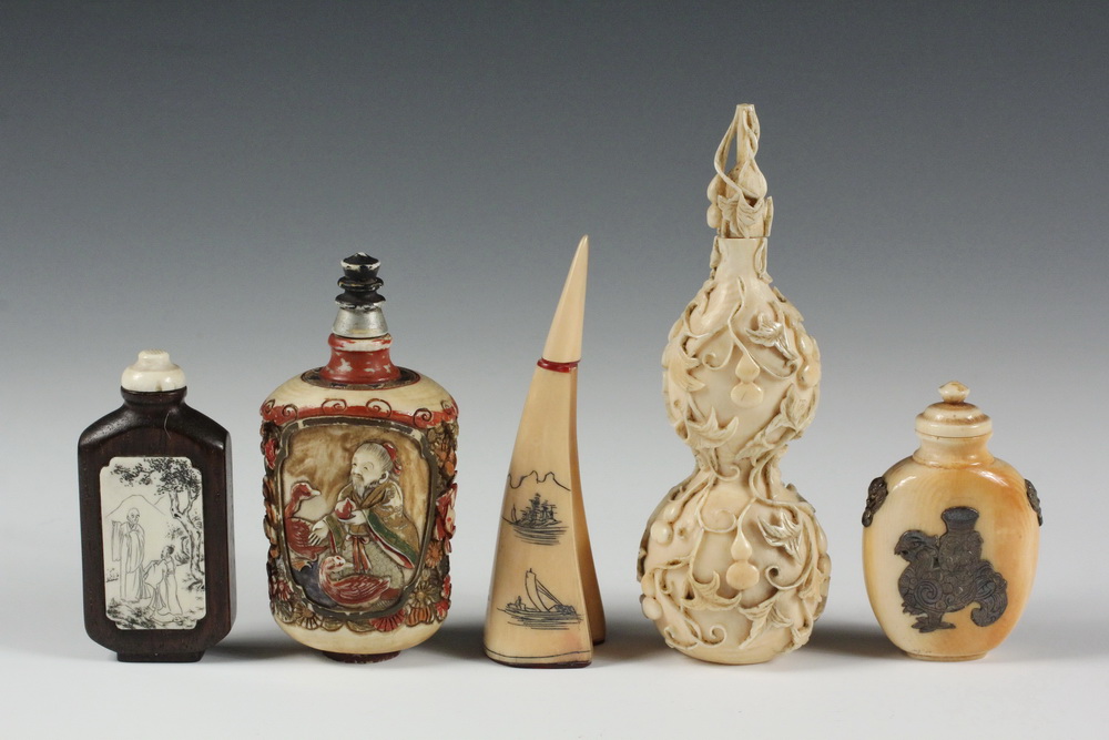 Appraisal: A GROUP OF IVORY SNUFF BOTTLES - Including A Carved