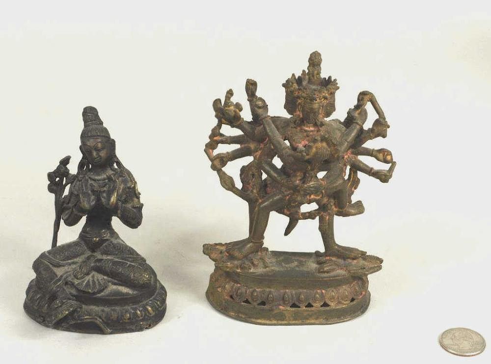 Appraisal: Two Nepalese Metal Deities Two Nepalese metal deities comprising a