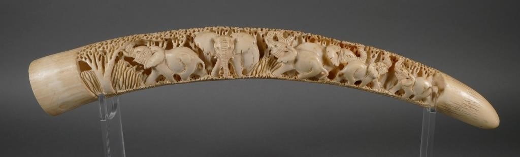 Appraisal: Antique ivory tusk with scene of six carved elephants Approx