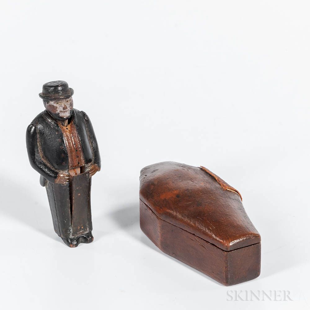 Appraisal: Miniature Pornographic Man in a Coffin Miniature Pornographic Man in