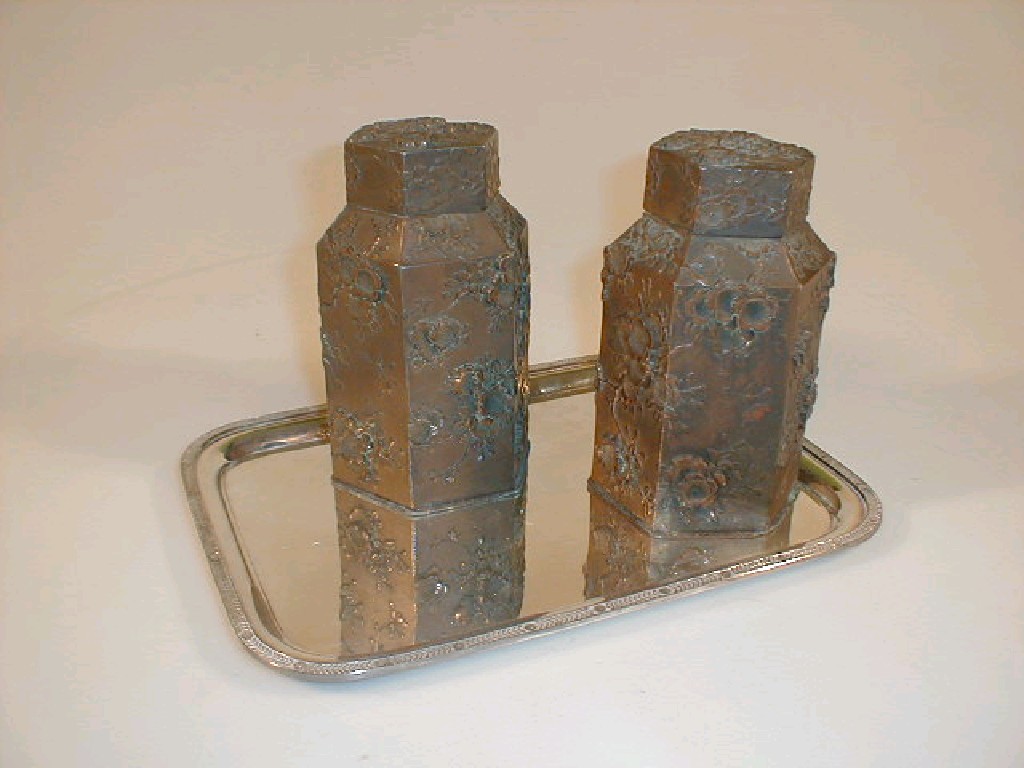 Appraisal: A pair of Japanese bronzed tea canisters with covers and