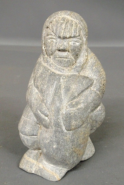 Appraisal: - Inuit carved stone figure of an Eskimo holding a