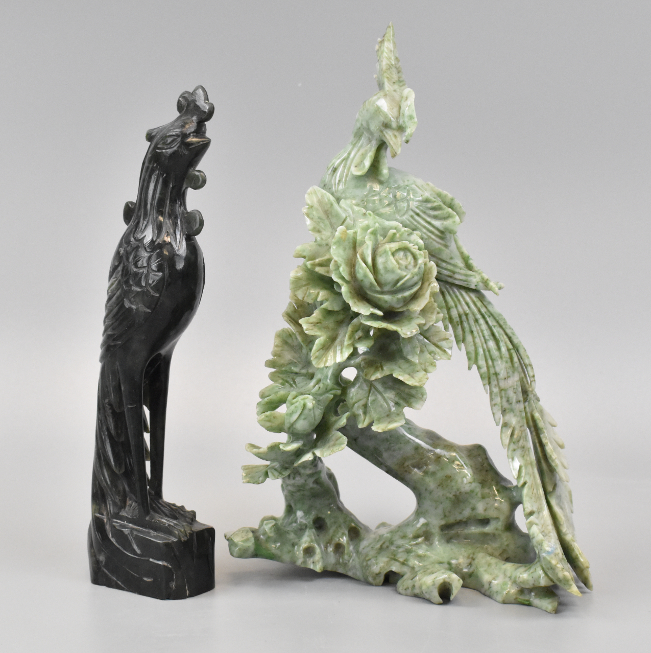 Appraisal: Jadeite carvings of peacocks Smaller one is narrow and carved