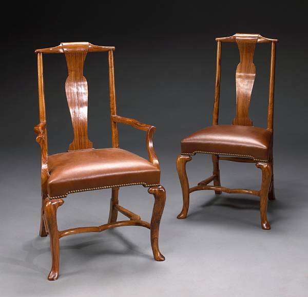 Appraisal: A set of twelve George I style walnut dining chairs