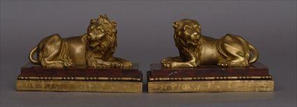 Appraisal: PAIR OF LOUIS XVI-STYLE MARBLE-MOUNTED GILT-BRONZE FIGURES OF LIONS Each