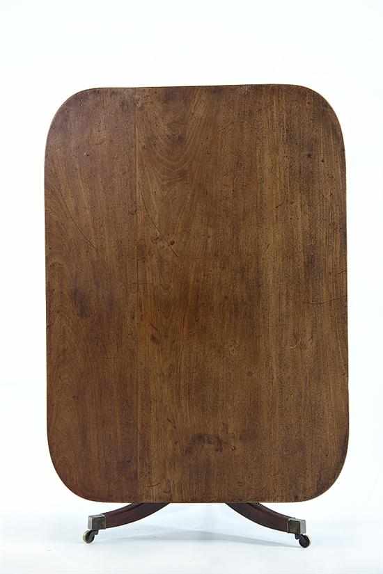 Appraisal: Regency mahogany breakfast table circa rectangular top with rounded corners