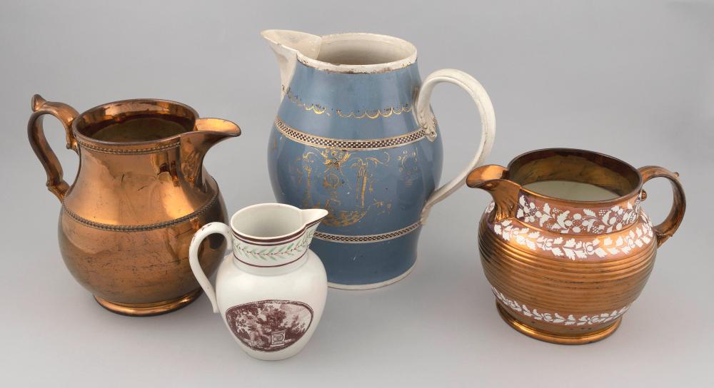 Appraisal: FOUR CERAMIC PITCHERSFOUR CERAMIC PITCHERS Two copper lustre heights and