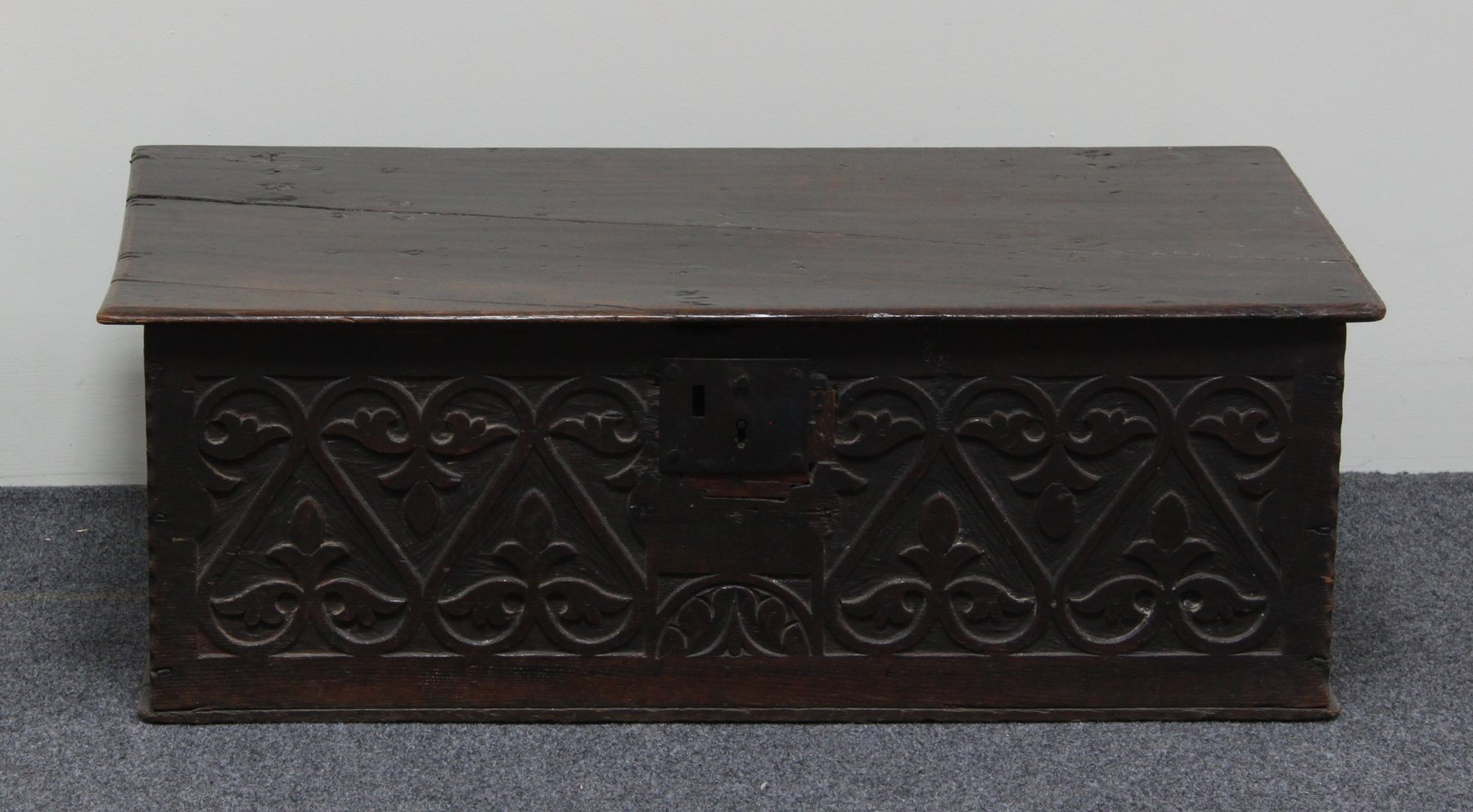 Appraisal: A th Century oak bible box with carved fret front