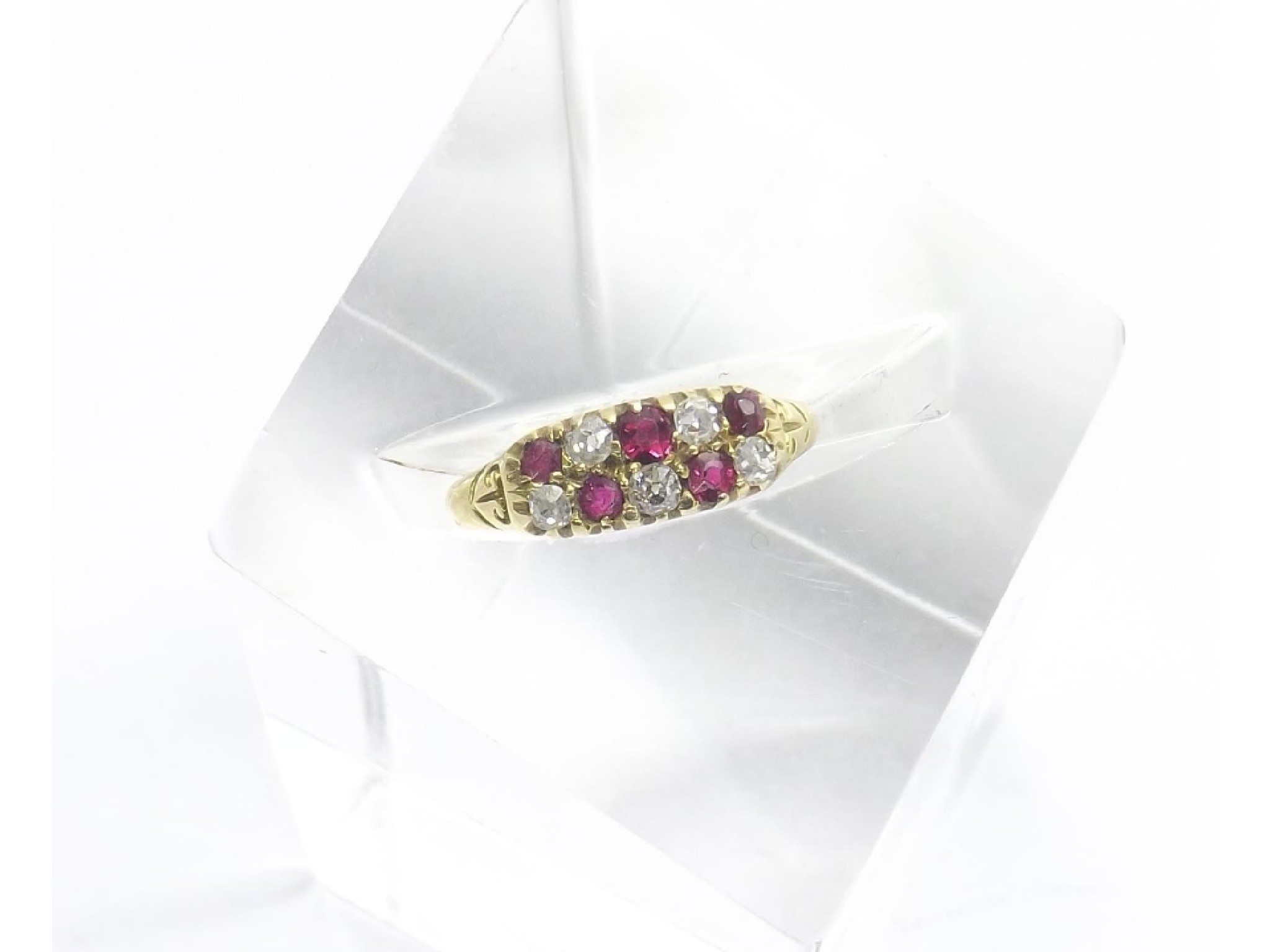 Appraisal: Attractive yellow gold ruby and diamond claw set ring ring