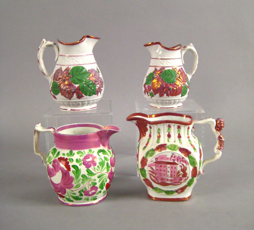 Appraisal: Four pink luster pitchers th c h h h h