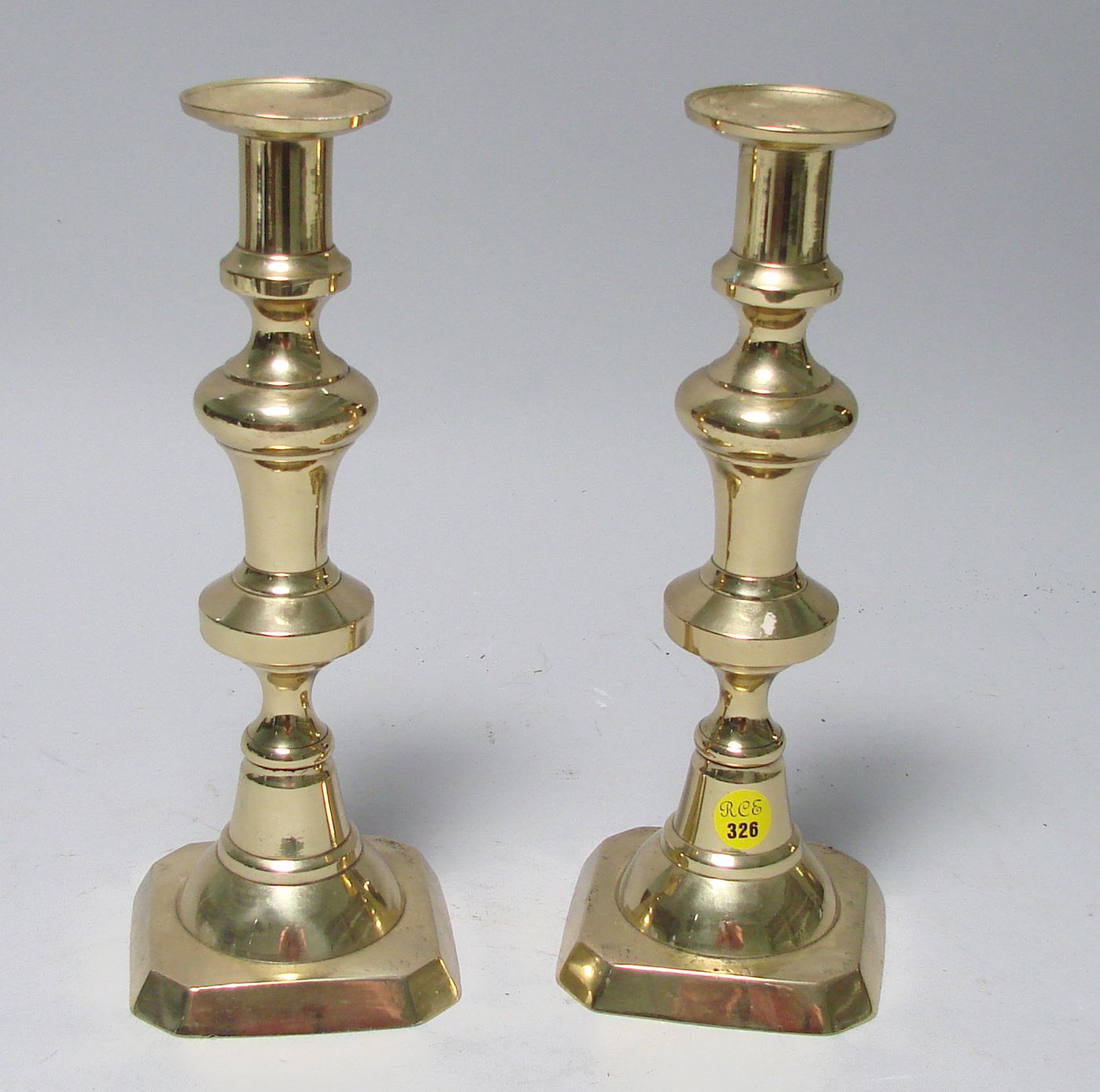 Appraisal: PAIR OF BRASS PUSH-UP CANDLESTICKS th CenturyHeight