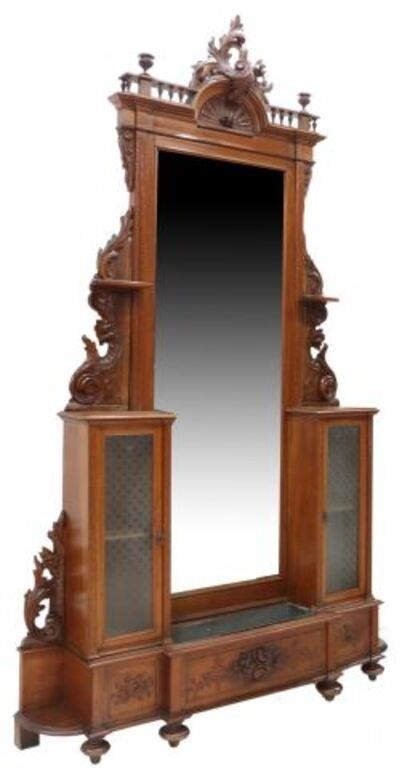 Appraisal: Italian walnut mirrored hall stand th c having large foliate