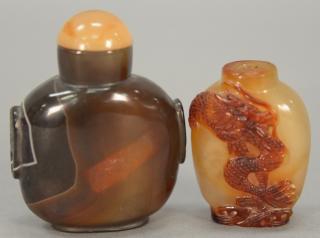 Appraisal: Two carved snuff bottles including one carnelian carved with dragon