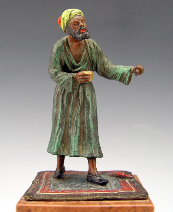 Appraisal: BERGMANN STYLE ORIENTALIST COLD PAINTED BRONZE Figure of man holding