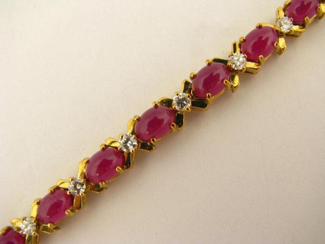 Appraisal: K Yellow gold La Triomphe bracelet with oval cut rubies