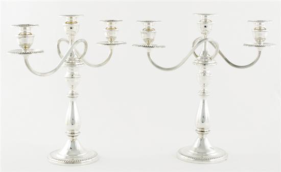 Appraisal: Pair American sterling three-light candelabra center baluster supporting scrolling arms