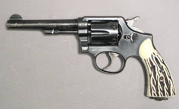 Appraisal: A Smith amp Wesson Model Hand Ejector double action revolverBritish