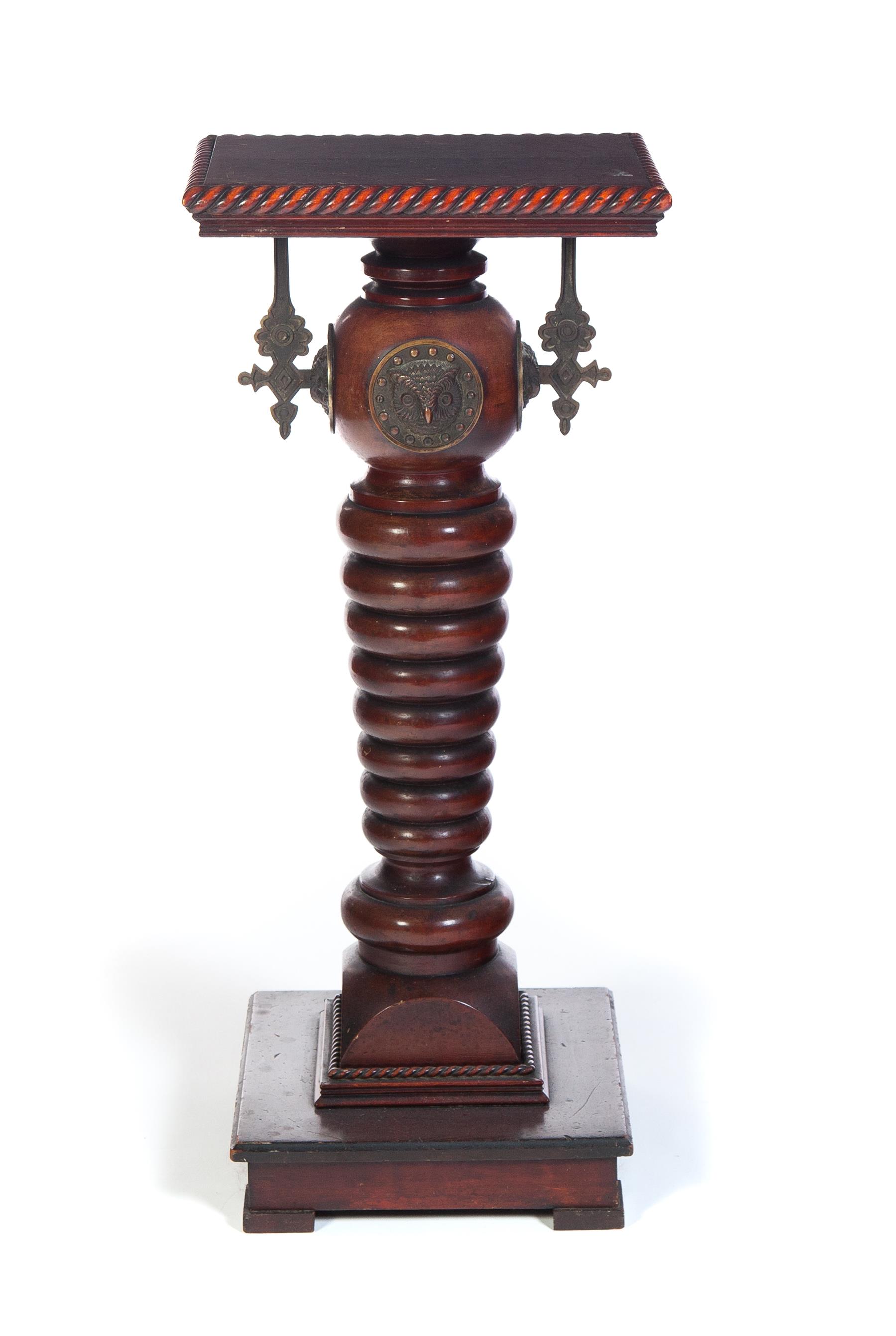 Appraisal: ORNAMENTAL FERN STAND WITH OWL DECORATION Twentieth century Half-rope twist