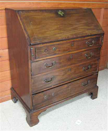 Appraisal: GEORGE III MAHOGANY SLANT-FRONT SECRETARY English early th century the