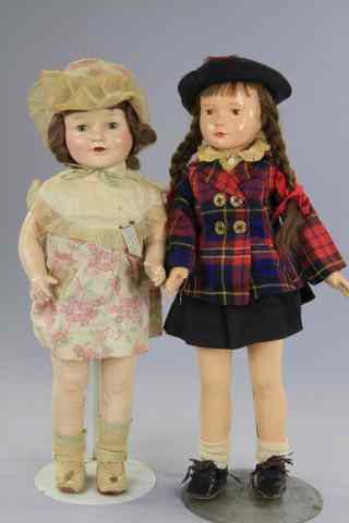 Appraisal: LOT OF TWO AMERICAN COMPOSITION DOLLS In plaid jacket is