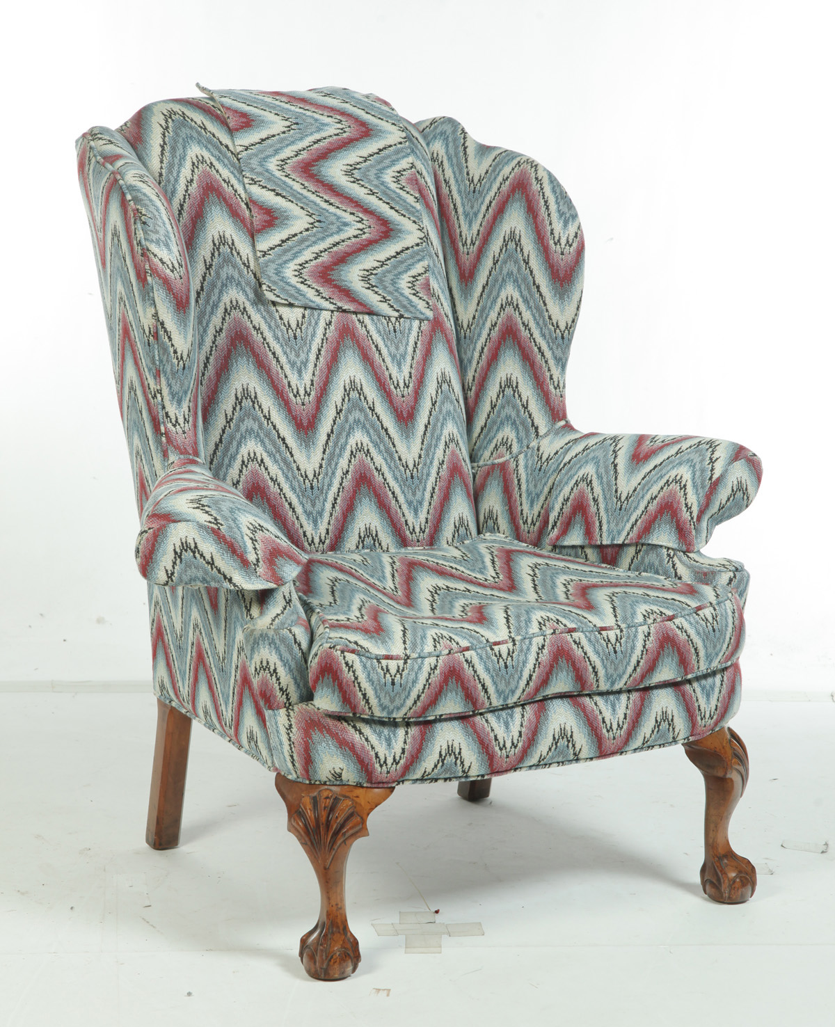 Appraisal: CHIPPENDALE-STYLE WING CHAIR WITH BALL AND CLAW FEET American mid