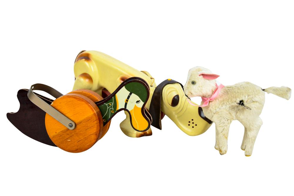 Appraisal: THREE VINTAGE TOYSincluding a plastic dog pull toy a lacquered