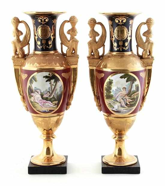 Appraisal: Pair French style porcelain urns Classical form painted with romantic