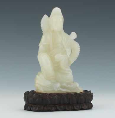 Appraisal: A Carved White Jade Quan Yin Carved white jade depicted