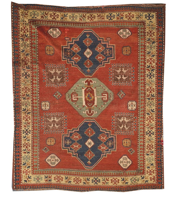 Appraisal: A KASAK RED GROUND RUG decorated a central polychrome interlocking