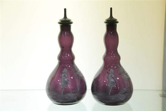 Appraisal: TWO BARBER BOTTLES Mary Gregory type bottles in amethyst with